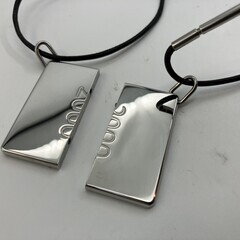 HERMES エルメス 2000年 シンボル ペアネックレス メタルトップ約4×2cm レザーコード ブラックの画像