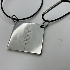 HERMES エルメス 2000年 シンボル ペアネックレス メタルトップ約4×2cm レザーコード ブラックの画像