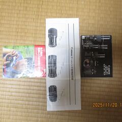 フィルム一眼レフカメラ Canon A-1 ブラック、ストラップ付き、レンズキャップあり。の画像