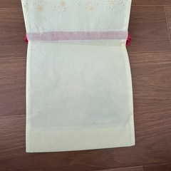 【未使用】クリスマス用の不織布製巾着型ギフトバッグの画像