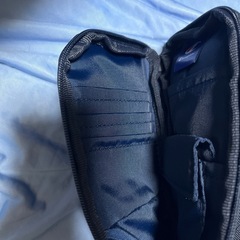 新品タグ付き　チャンピオン　ショルダー　首掛けに　スマホ入れ　カード入れにオススメの画像