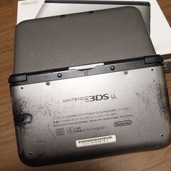 Nintendo 3DS LL モンハンソフト4個付の画像