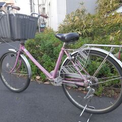大きなカゴの自転車です。の画像