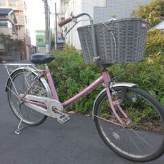 大きなカゴの自転車です。の画像
