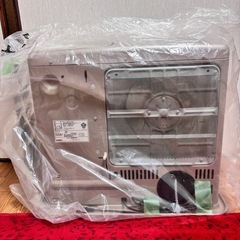 石油ストーブ&扇風機の画像