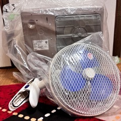 石油ストーブ&扇風機の画像