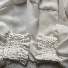 axes 白 長袖の画像