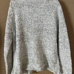 お上品なセーターの画像