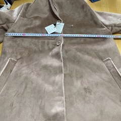 フード付きフェイクムートンコートの画像