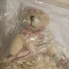 くまのタオルハンガーとタオルの画像