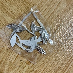 ニューボーンフォト　天使の羽と髪飾りの画像