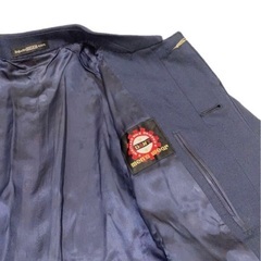 新品未使用タグ付きメンズコートの画像