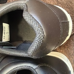 ブラックレースアップスニーカーの画像