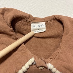 the lala ブラウン 長袖ロンパースの画像