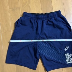 アシックスメンズ短パンの画像
