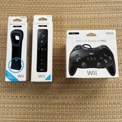 Wii本体＋別売りコントローラー＋ソフト２本の画像