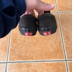 Vans ブラック スリッポンの画像