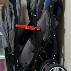 2人乗りベビーカー（レインカバー付き）の画像