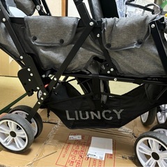 2人乗りベビーカー（レインカバー付き）の画像