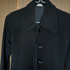 黒のコートの画像