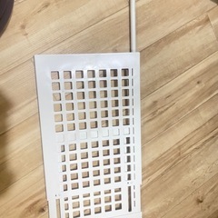 突っ張り棒とその棚の画像