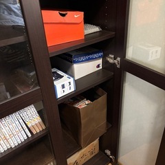 ニトリ 飾れるディスプレイ扉付き　スライド書棚 大型の画像