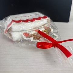 クリスマスラッピングのミニタオルの画像