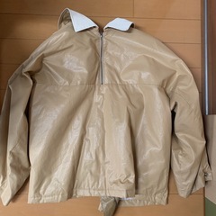 ベージュ フード付き テーラードジャケットの画像