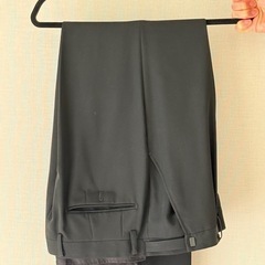 メンズ フォーマルスーツ 黒 上下セット 新品未使用の画像