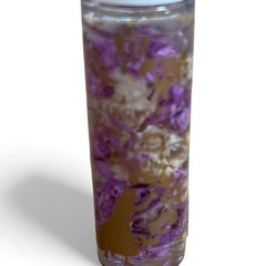 ディズニーストア購入はラプンツェル リップグロス 紫色のフラワー入り ☆ 新品の画像