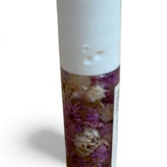 ディズニーストア購入はラプンツェル リップグロス 紫色のフラワー入り ☆ 新品の画像