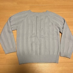 ビジュー付き水色ニットの画像