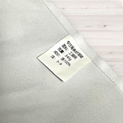 「Becanno」のエプロンで、シンプルで無地のデザインが特徴です。男女兼用で、シェフや飲食店スタッフ、家事をする方にも適しています。の画像