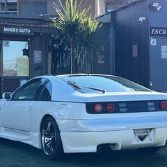 ローンは毎月31,900円～　日産　フェアレディZ　バージョンSツインターボ　５型後期モデル　ＶｅｉｌＳｉｄｅエアロ　ＡＶＳモデル５アルミホイール　純正５ＭＴ　柿本改２本出しマフラー　車高調　Ｔバールーフ　フェラーリ風テールランプ　タイミングベルト交換済みの画像