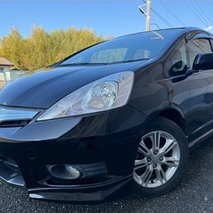 ガソリン代 節約☆HYBRID入りました‼️23年式☆月々1万円〜分割払い可❗️車検2年付き！大人気☆ホンダ フィット☆ナビ付き☆走行中DVD見れます☆ETC☆バックカメラ☆ドラレコ付きのフル装備☆ウィンカーミラー☆フル装備☆社外アルミ☆車内広々‼️の画像