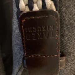 キクチタケオのコートとベルトの画像