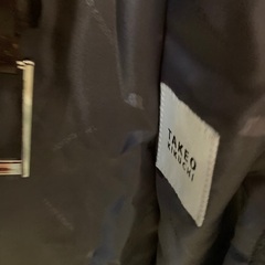 キクチタケオのコートとベルトの画像