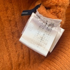 ニット　オレンジ
の画像