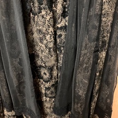 個性的な薄手のコート中古の画像