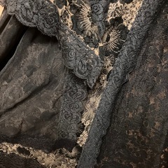 個性的な薄手のコート中古の画像