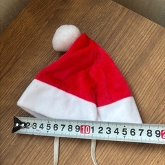 猫ちゃんうっとりゴム（未使用）とサンタさんの帽子の画像