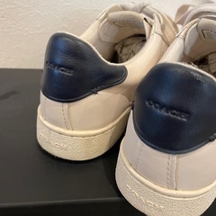 COACH アイボリー スニーカーの画像