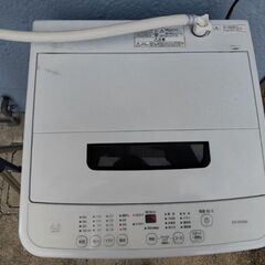 洗濯機と物干しスタンドのセットの画像