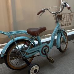 コマつき！14インチ自転車の画像