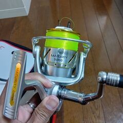 釣り竿とリールの画像