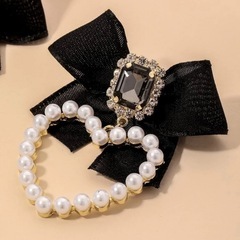 黒 リボン パール ピアスの画像