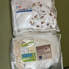 ベビー布団とシーツの画像