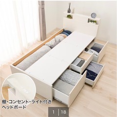 一人暮らし引越しベッドやコタツや本棚の画像