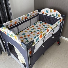 ベビーベッド　ガード調節可の画像