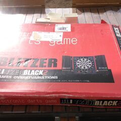 ダーツの的とそれを固定する木の枠組みの画像